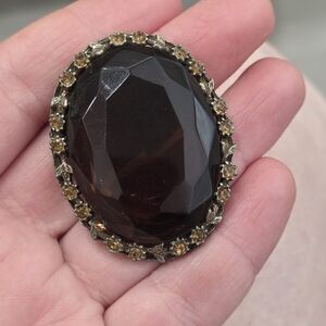 Vintage-Style Black Faceted Glass Oval Brooch with Gold Accents